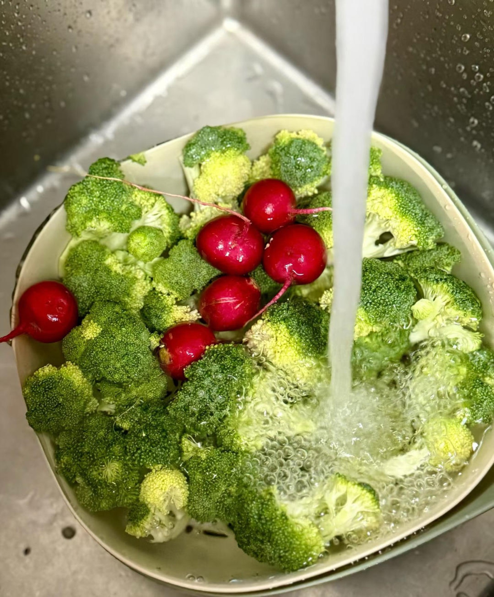 Wash the broccoli and cherry radishes; slice the radishes paper-thin and toss with salt, sugar, white vinegar, and a pinch of umami seasoning, then let them pickle while you cook.