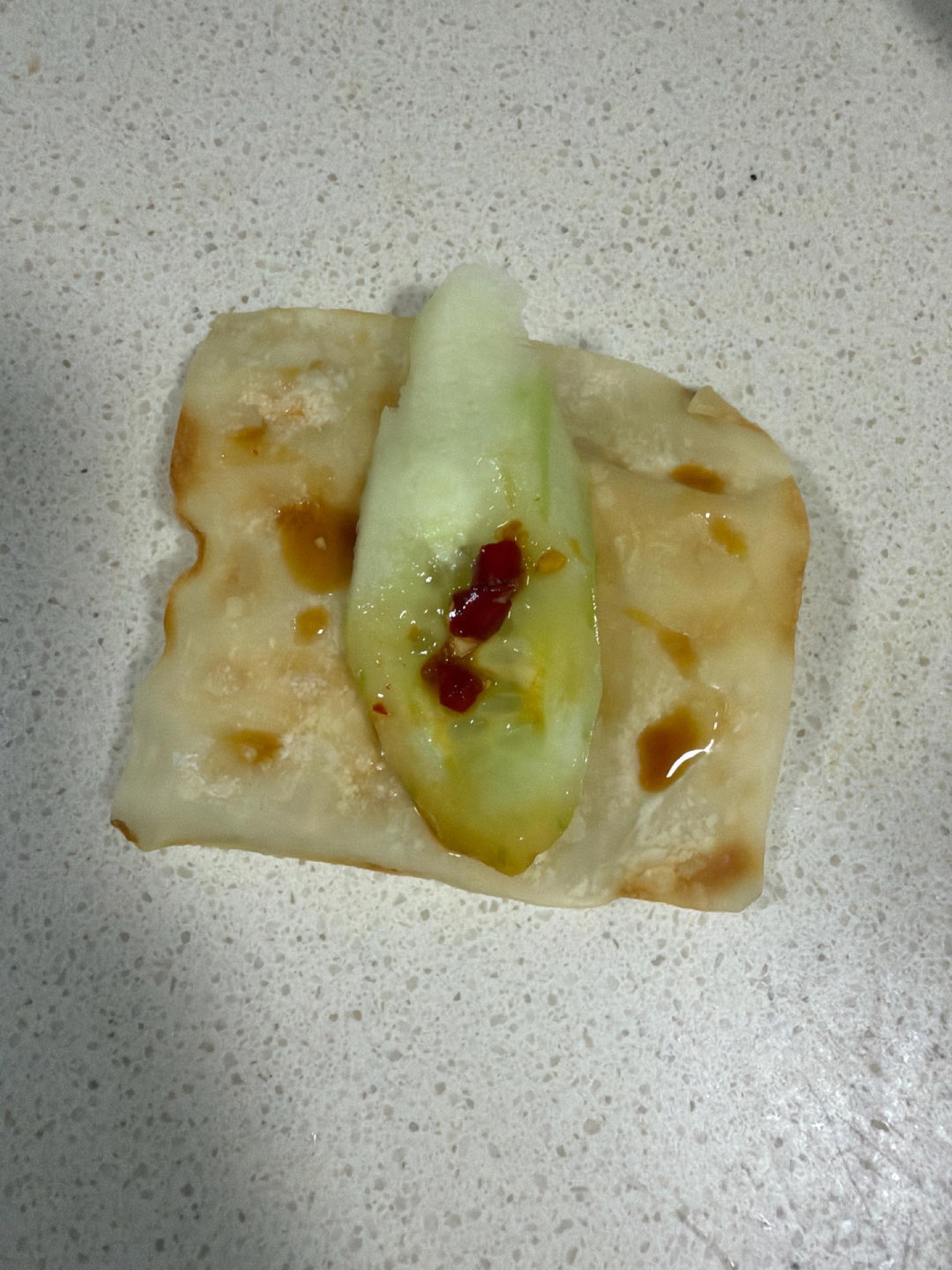A full plate of wonton skin cucumber bites ready to serve