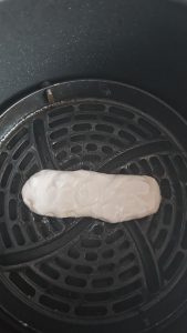 Shaped and flattened glutinous rice cakes on a tray