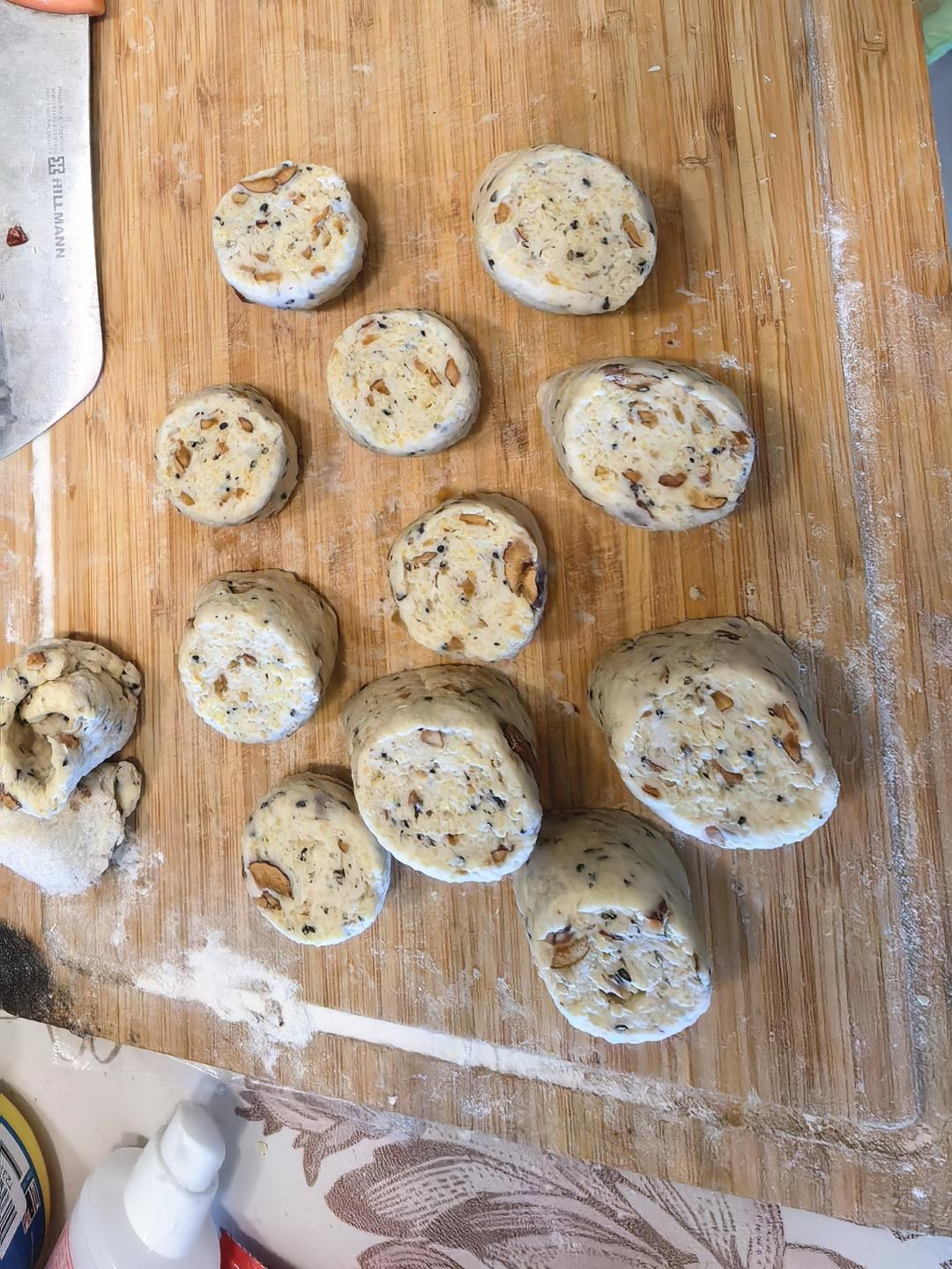 Roll the dough flat, then roll it up
