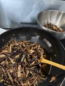 Fried mushrooms scooped out with their oil