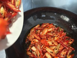 Red chiles sliced diagonally
