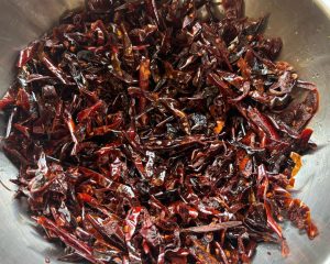 Chiles fried until almost black and crisp