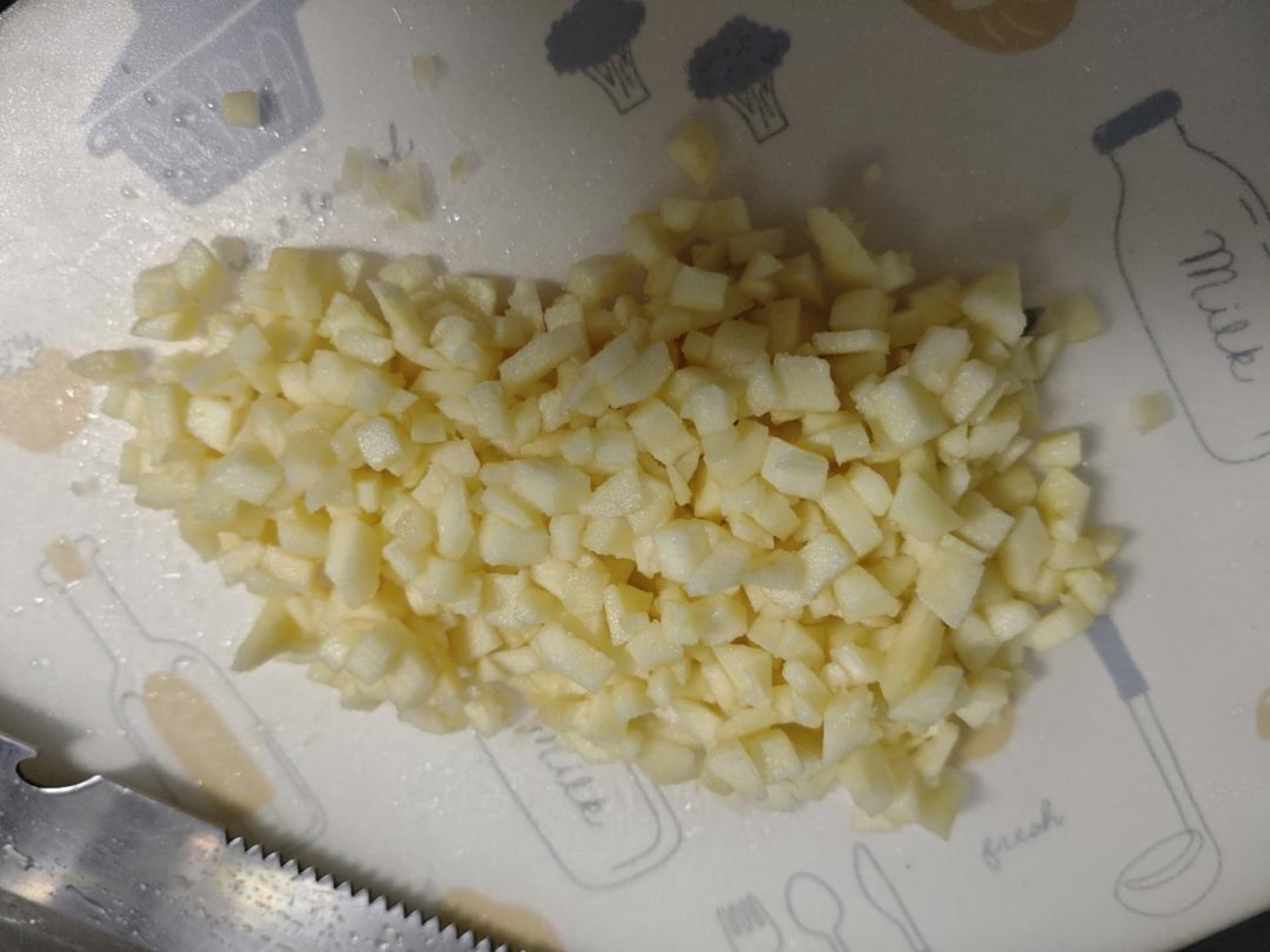 Peel the apple, then cut it into small, even dice.