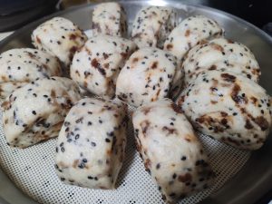After proofing, turn on the heat and steam for 10 to 13 minutes, then let them rest covered for 2 minutes before opening the lid.