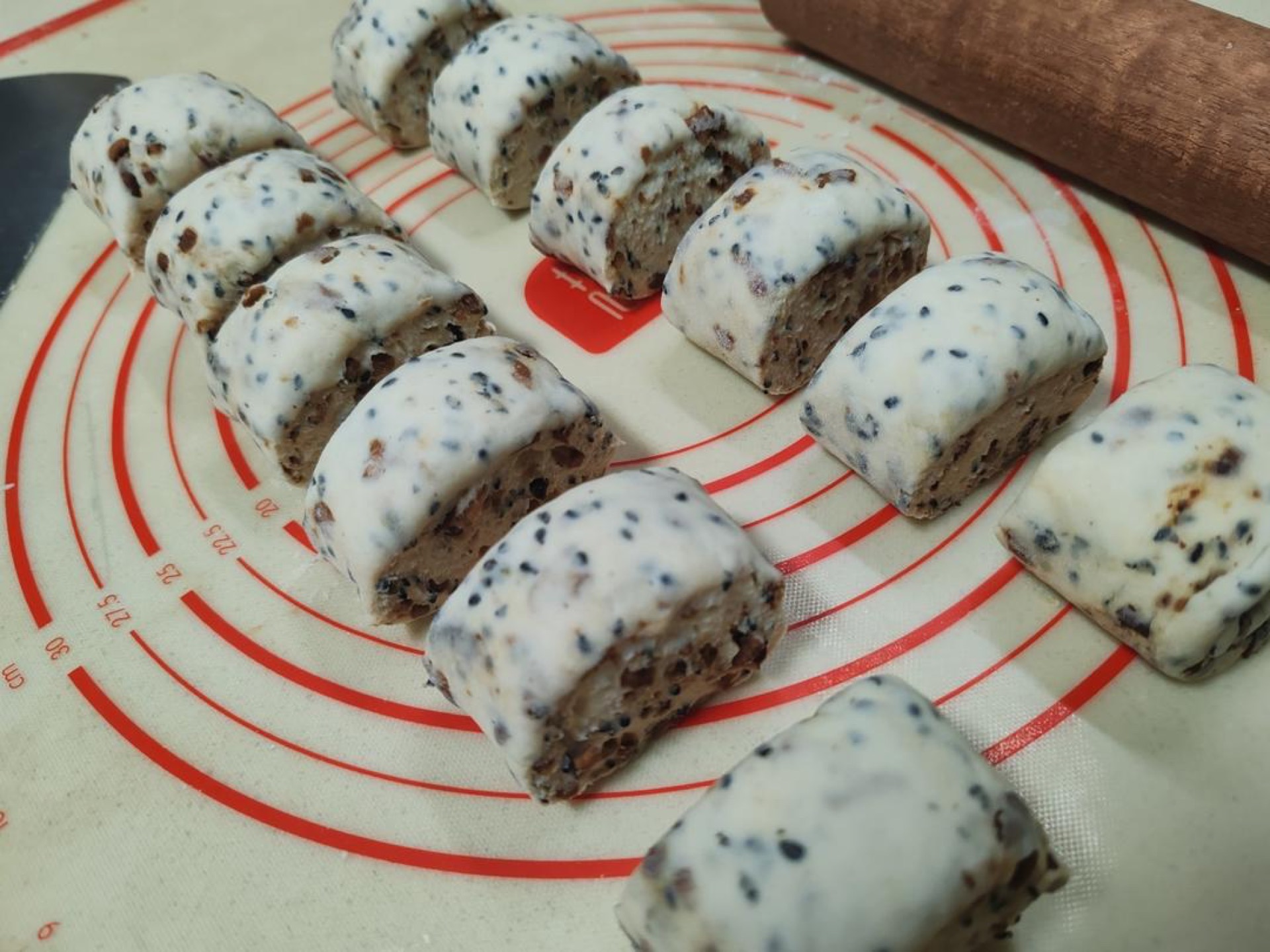 Cut the log into equal-sized pieces; this batch makes 12 buns.