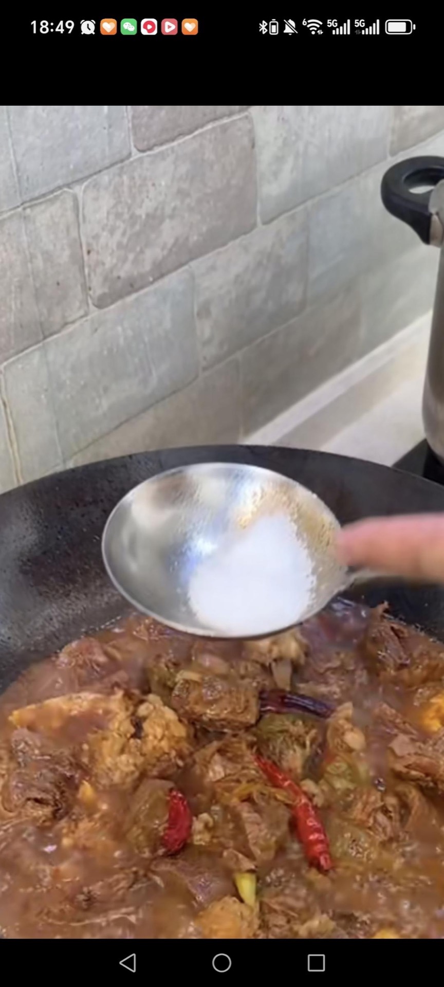 Add the appropriate amount of salt and chicken bouillon.