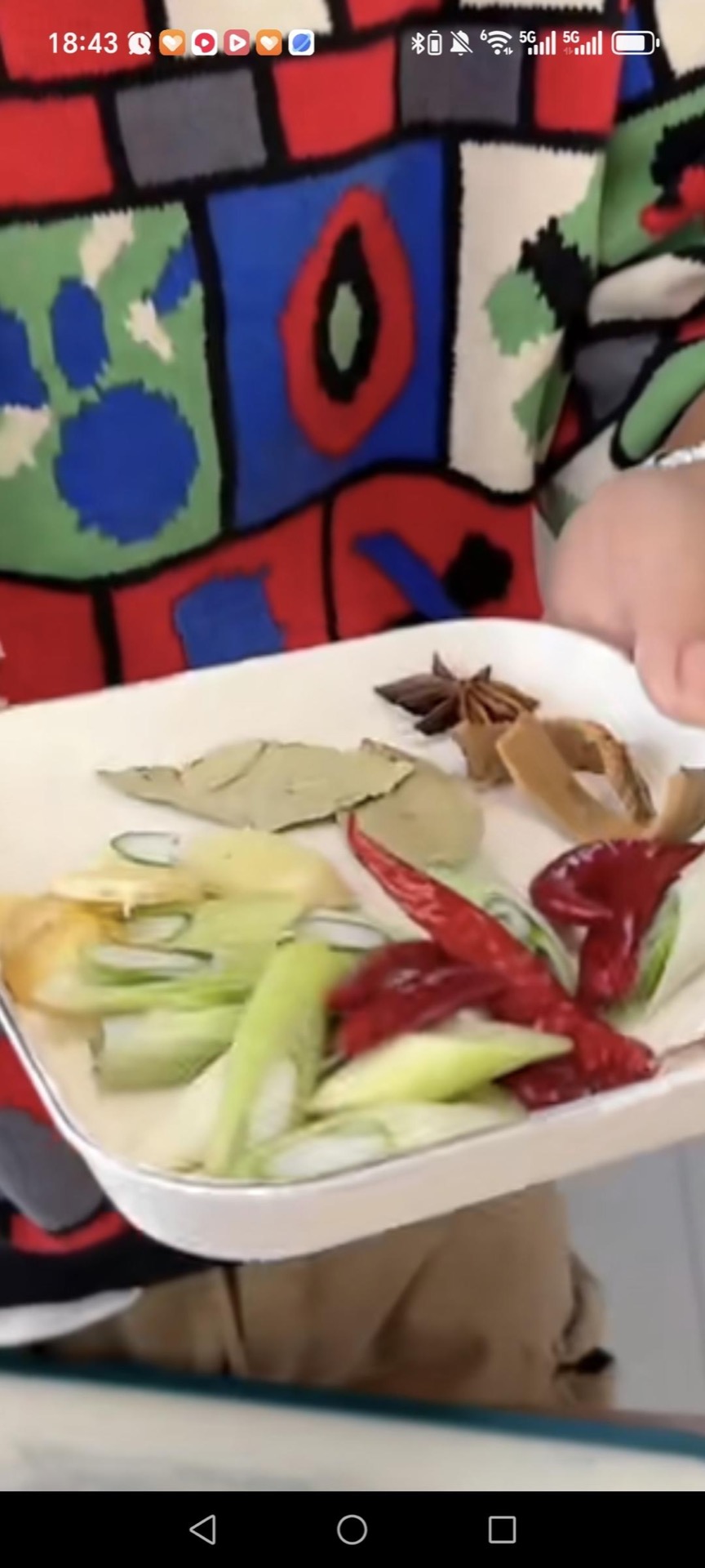 Prepare the aromatics: scallion, ginger, cinnamon bark, star anise, bay leaves, and dried chilis as shown.