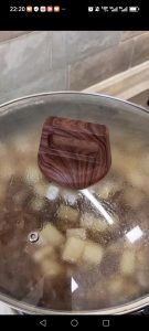Cover the wok again and simmer for 20 minutes, until the radish is translucent and the beef is fork-tender.