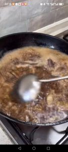 Pour in boiling water to just cover the beef, then bring the liquid back to a gentle simmer.