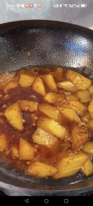 Add boiling water to the wok.