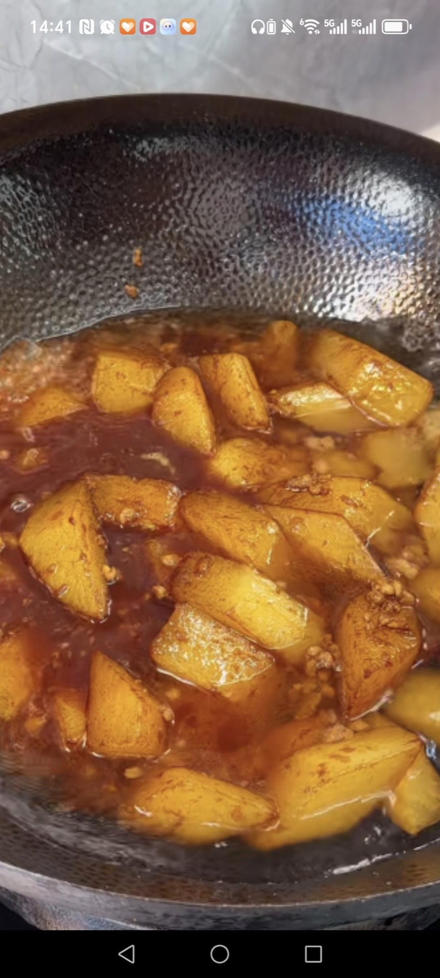 Add boiling water to the wok.