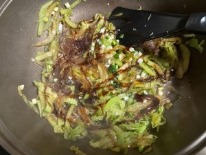 Drizzle in the oyster sauce, cover again, and braise a little longer until the vermicelli is soft and tender, then serve hot.
