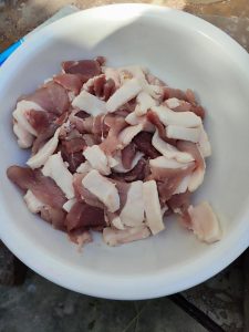 Wash the pork and slice it thinly — the thinner the slices, the more flavor they absorb; the pieces in the photo are on the large side, so go thinner if you can.