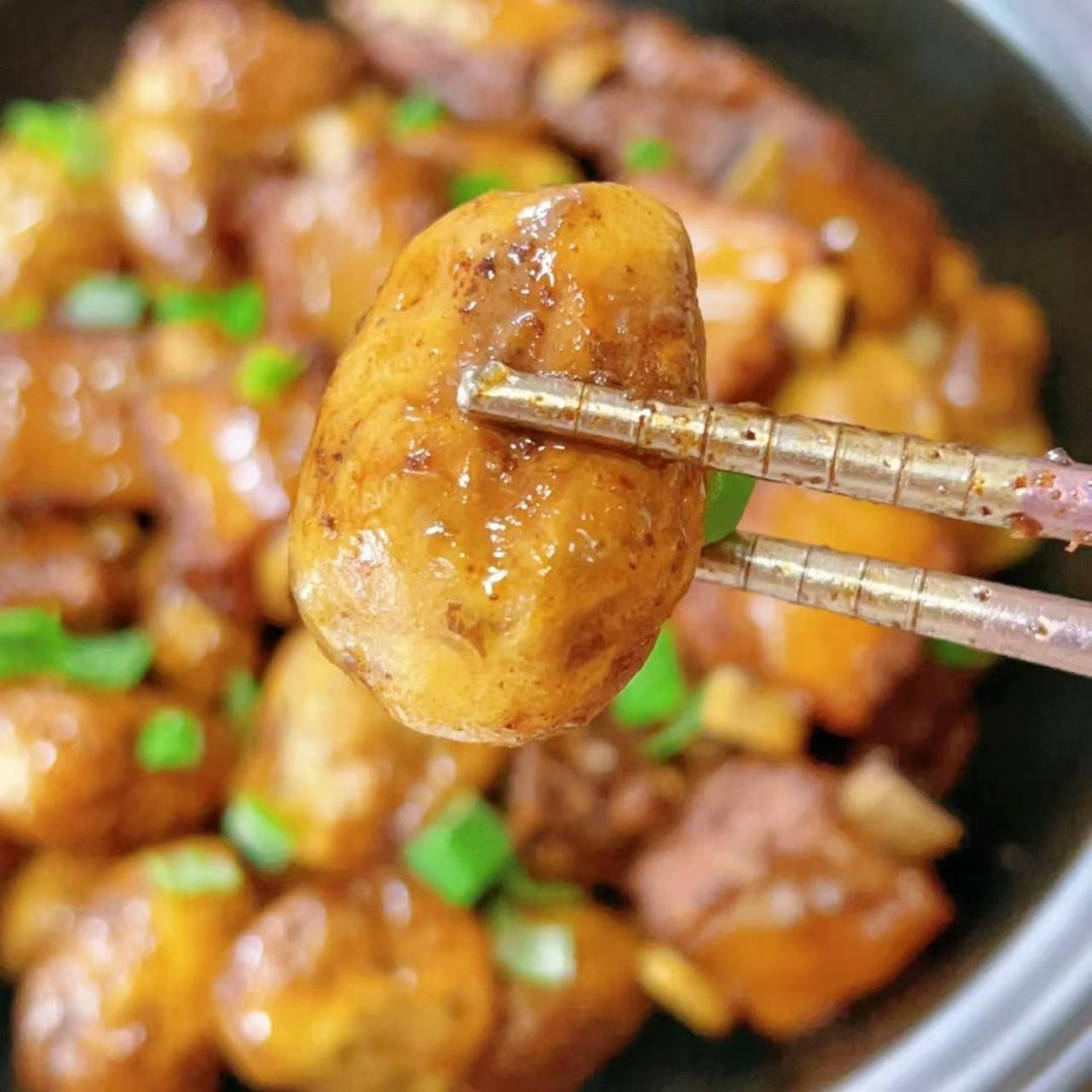 The taro is glazed in the rich, thick sauce.