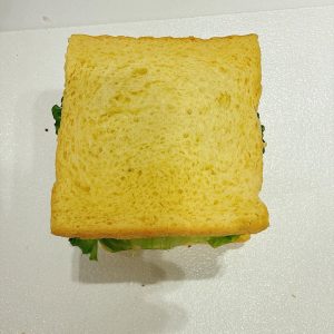 Cover with a second slice of toasted bread.