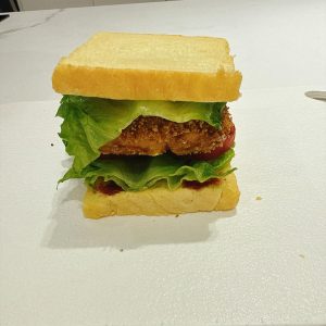 The towering sandwich is now fully assembled.