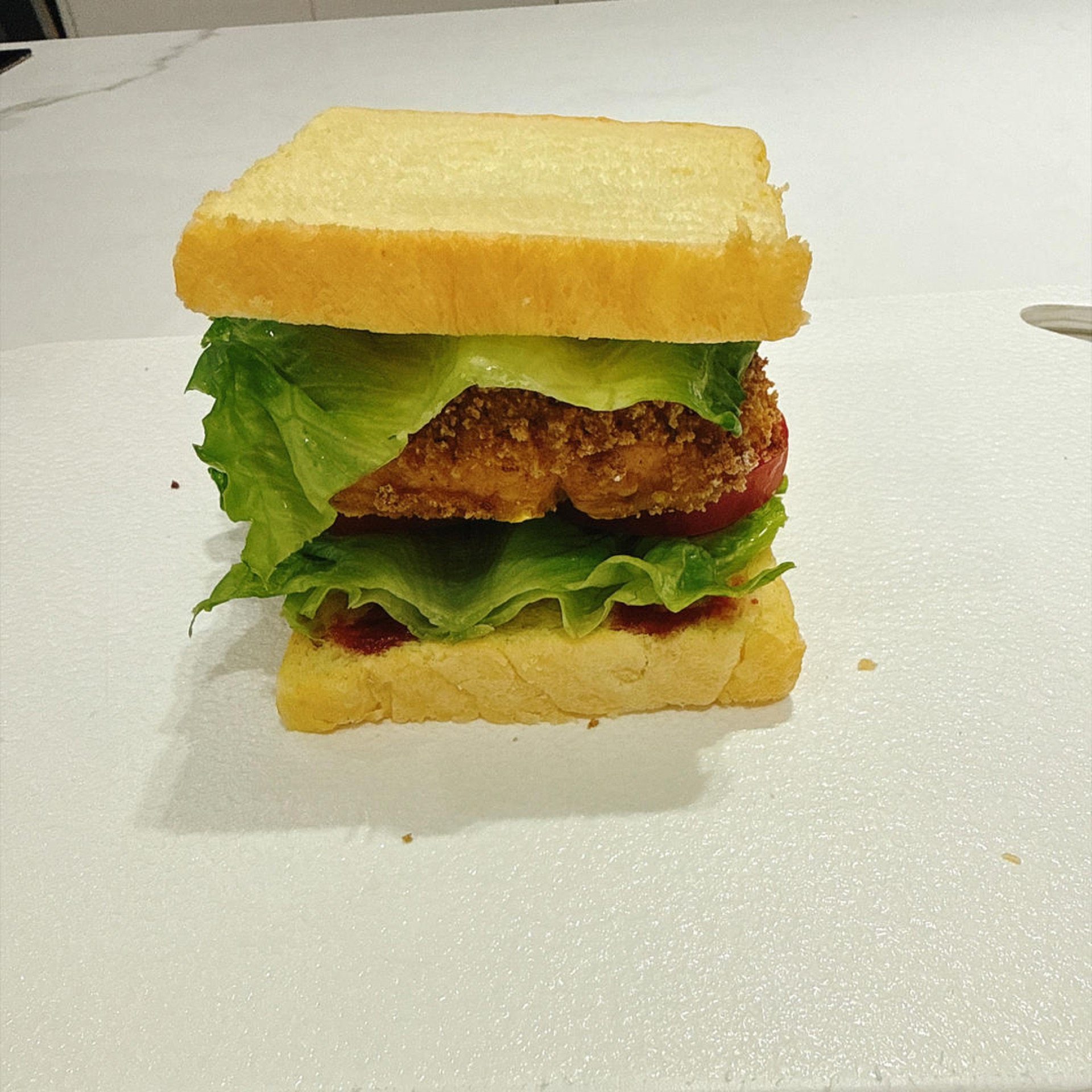 The towering sandwich is now fully assembled.
