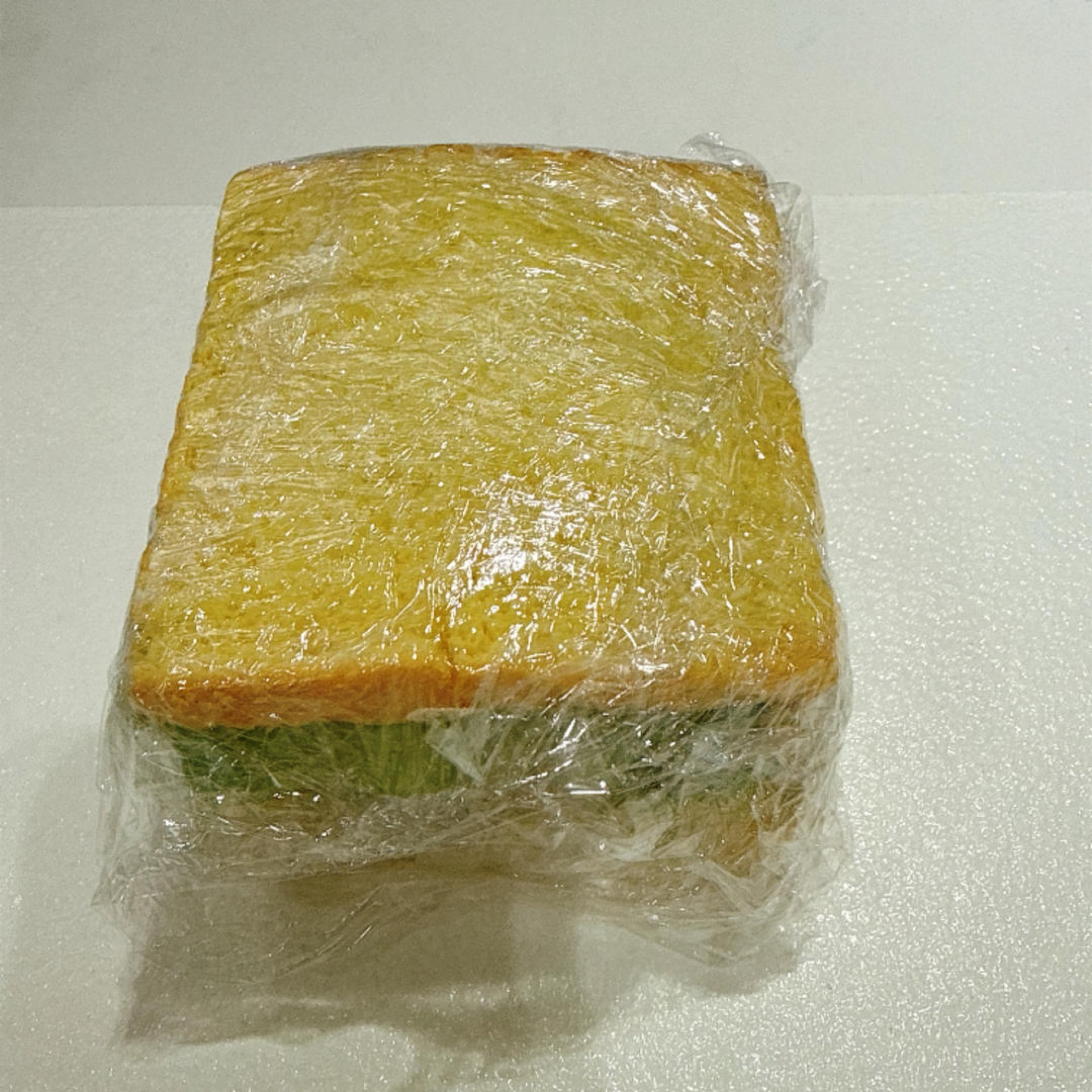 Wrap the sandwich tightly and firmly to hold everything together.
