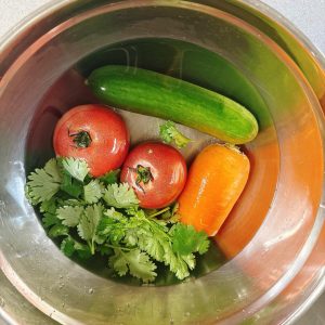 I used whatever I had in the fridge: tomato, carrot, cucumber, and cilantro, though plenty of other things work too, such as cooked corn kernels, apple, avocado, bell pepper, pear,