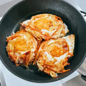Turn off the heat and lift the pancakes out of the wok.