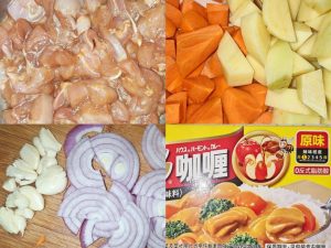 The ingredients: marinated chicken thigh meat, potatoes and carrots cut into diamond chunks, garlic smashed, onion sliced, and curry blocks ready.