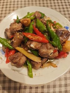 Give it a few more tosses and it is ready to come out of the wok — dry, fragrant, and deeply savory.
