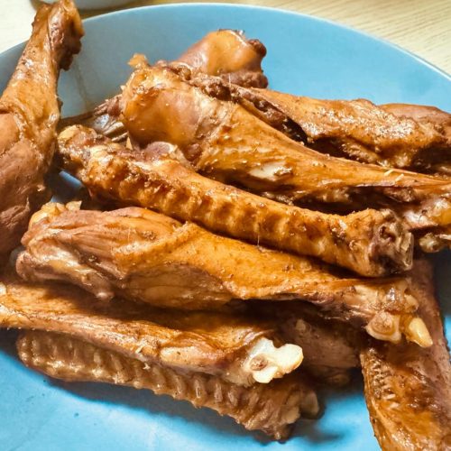 Braised duck wings and vegetables in a dark soy sauce marinade