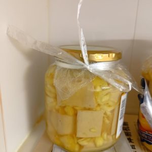 Weigh out 80 grams of salt and 100 grams of sugar for the first cure.