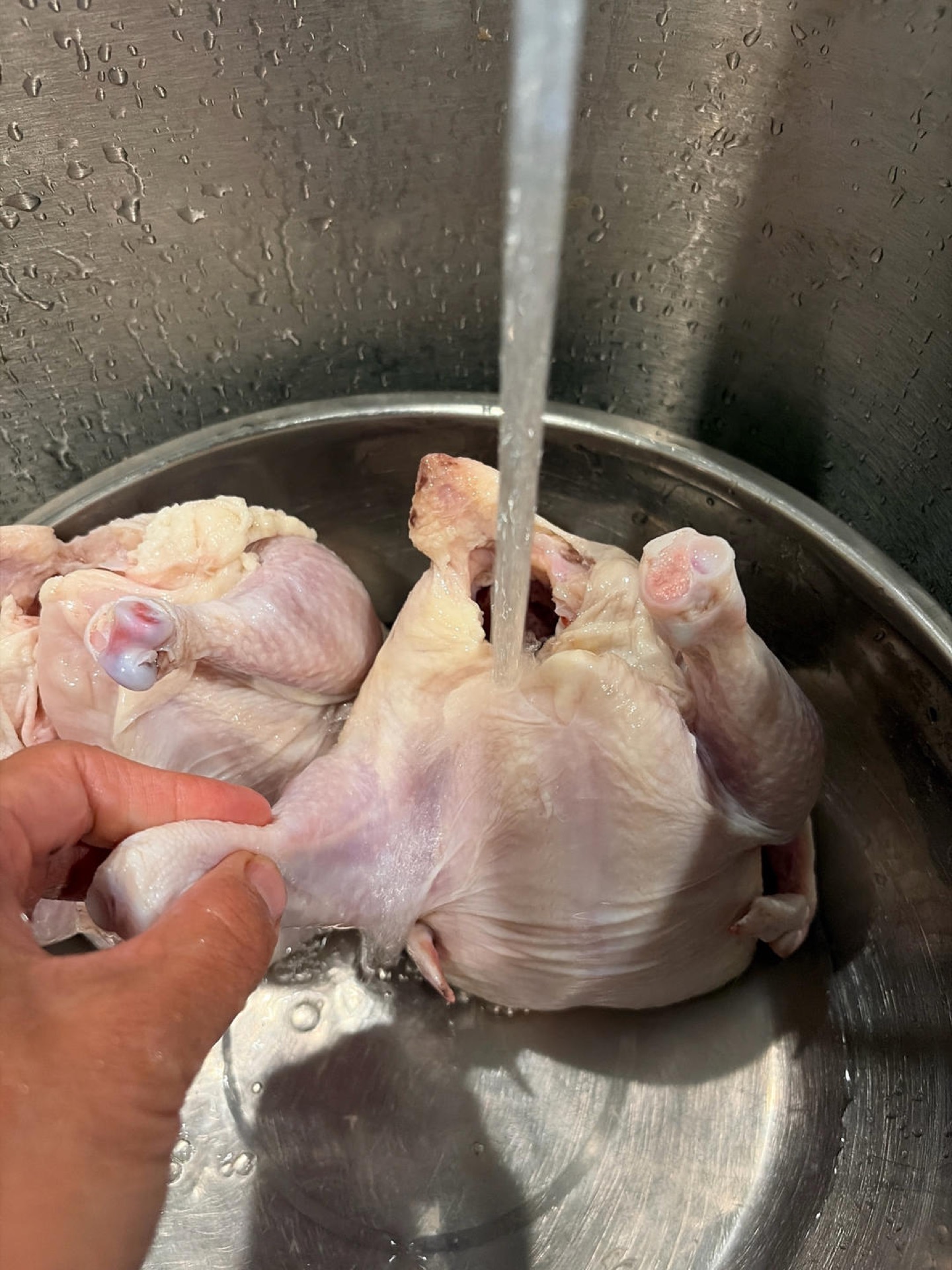 Rinse the chicken inside and out and pull away any stray fat or pinfeathers.