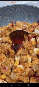 Add 2 tablespoons of light soy sauce, 1 tablespoon of dark soy sauce, and 1 tablespoon of oyster sauce.
