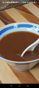 Whisk 3 tablespoons black vinegar, 2 heaped tablespoons sugar, 1 teaspoon dark soy sauce, 1 tablespoon light soy sauce, a pinch of salt, 1/2 cup water, and 1/2 tablespoon potato st