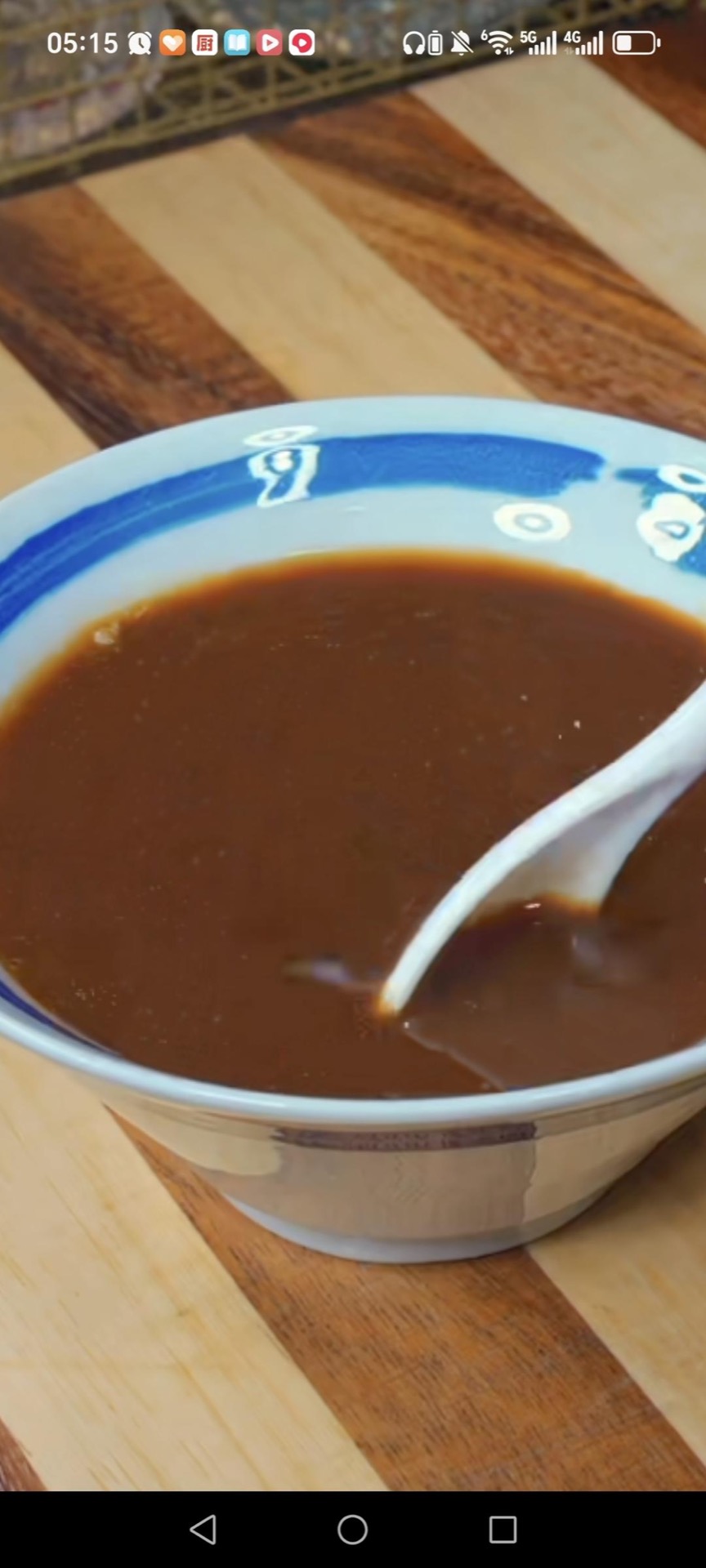 Whisk 3 tablespoons black vinegar, 2 heaped tablespoons sugar, 1 teaspoon dark soy sauce, 1 tablespoon light soy sauce, a pinch of salt, 1/2 cup water, and 1/2 tablespoon potato st