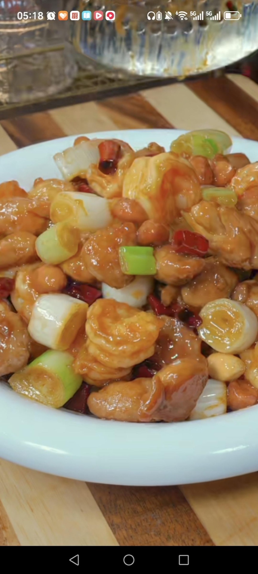 Scrape everything onto a warm platter, spoon the pan sauce over the top, and serve immediately with steamed rice.
