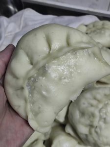 Place the buns in a steamer lined with parchment. Steam over cold water, bringing to a boil over high heat, then steam for 15 minutes. Turn off the heat and let rest for 3-5 minute
