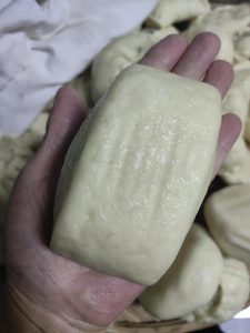 Any leftover dough can be shaped into small plain steamed buns (mantou) and steamed the same way.