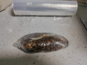 Roll each chicken breast tightly in plastic wrap to make the meat firmer, then refrigerate overnight.