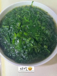 Serve it right away while it is hot, glossy, and green.