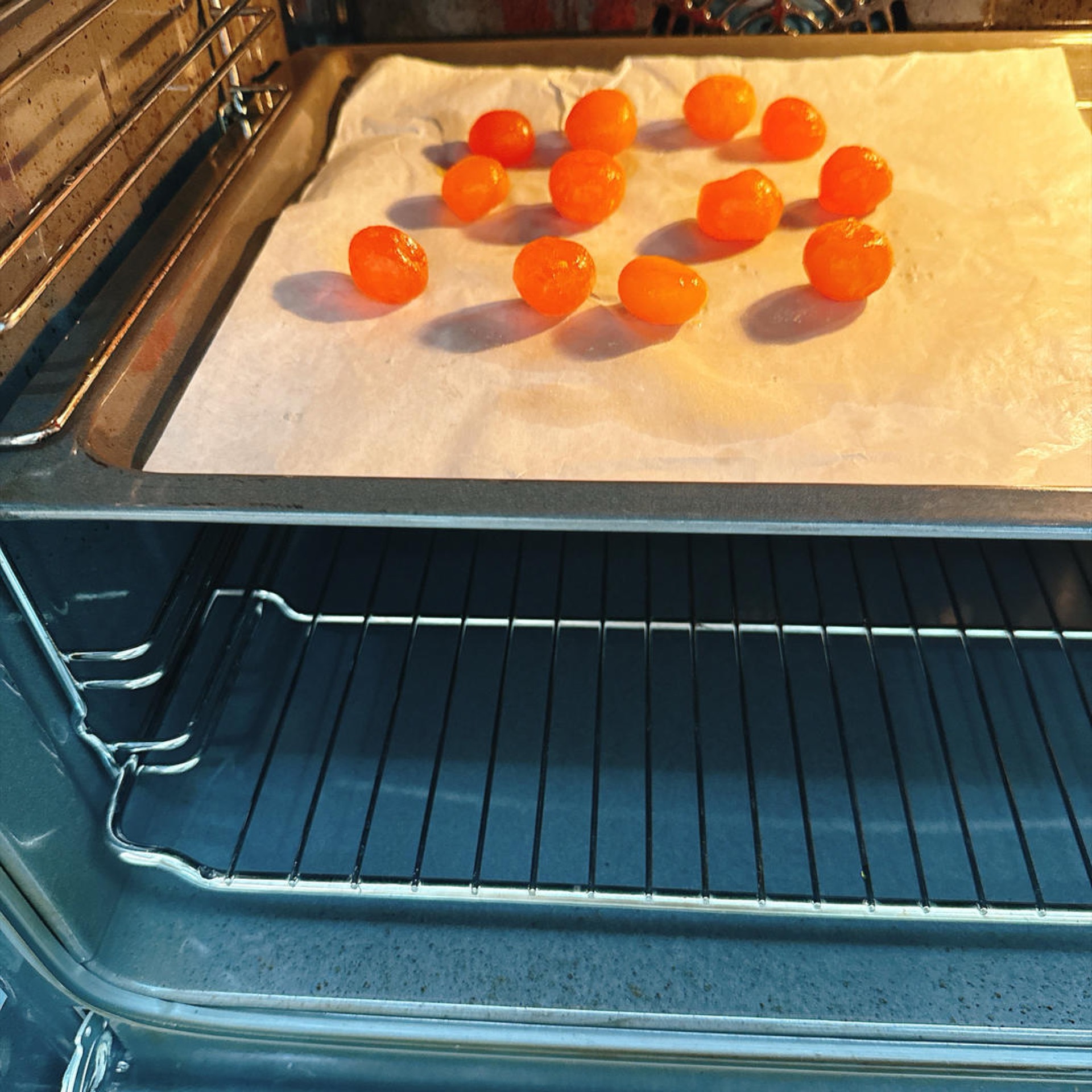 Preheat the oven to 350°F (180°C) and place the 12 salted duck egg yolks on a baking tray, then roast them at 350°F (180°C) for about 15 minutes.