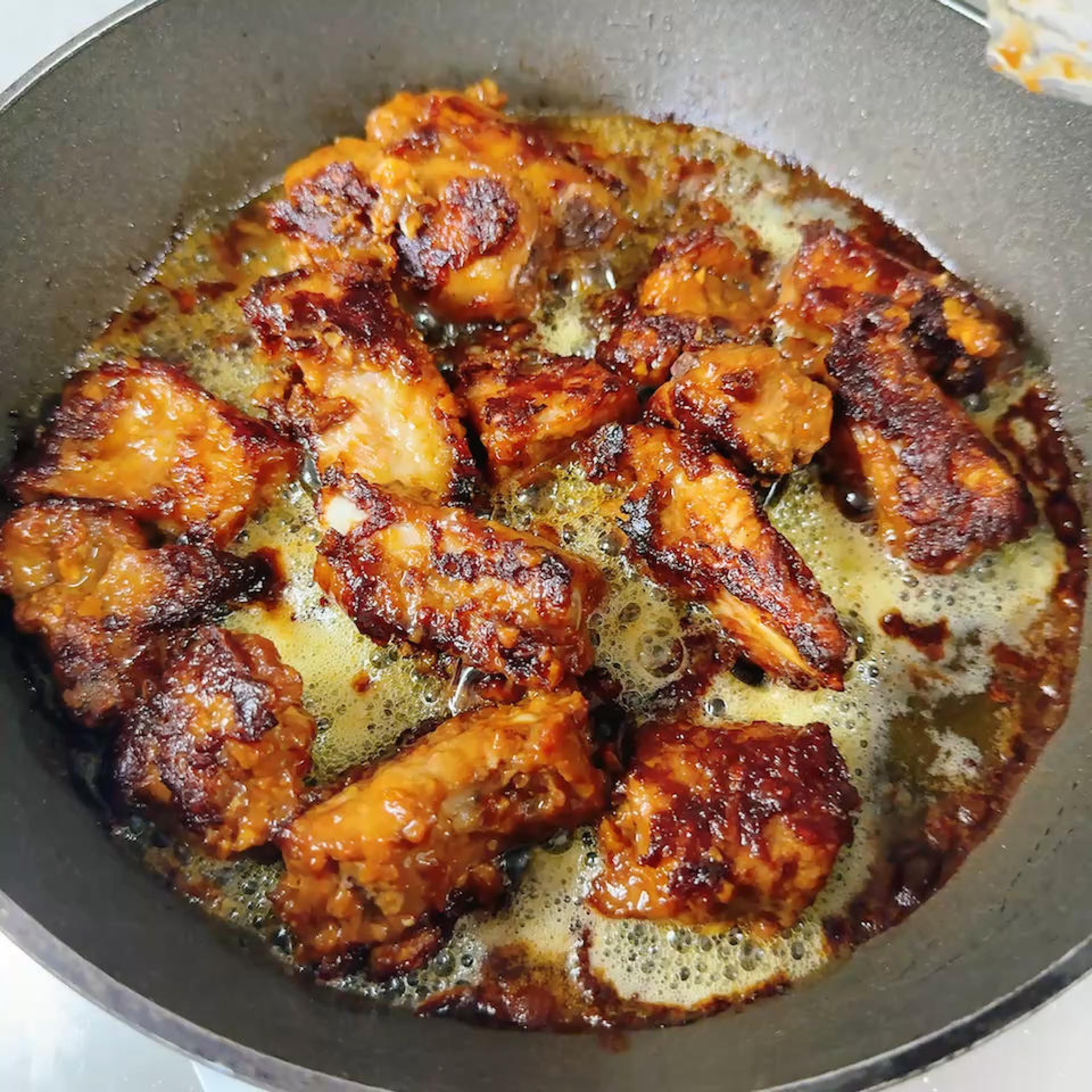 Keep frying until the ribs are cooked all the way through.