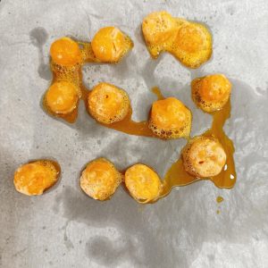 Take the roasted yolks out of the oven and let them cool completely before using.