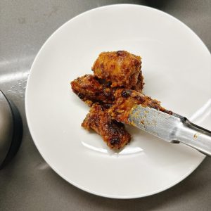 Arrange the ribs on a serving plate.