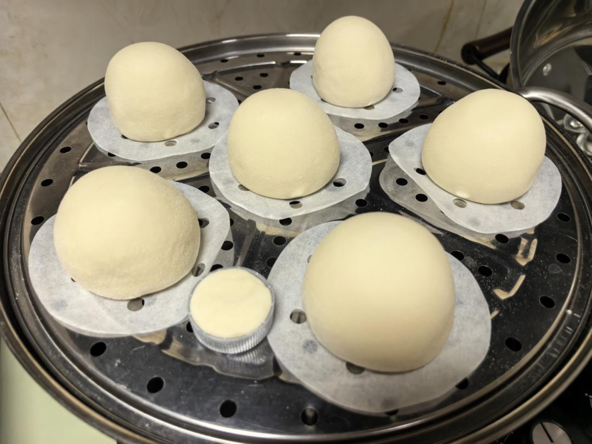 Put them in water that is warm but not hot to proof for 40 minutes; a bottle cap makes it more intuitive to judge.