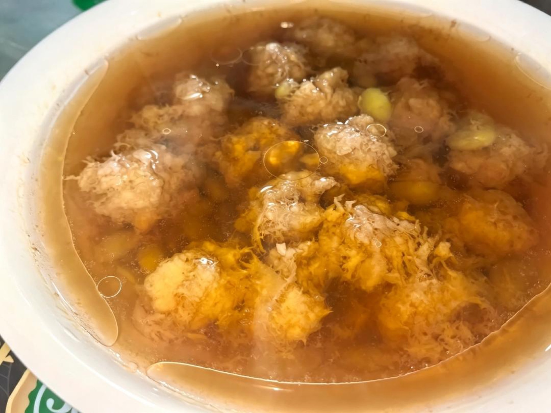 Taste the broth once it is out of the steamer, then add a little more salt and light soy sauce to taste and serve hot.