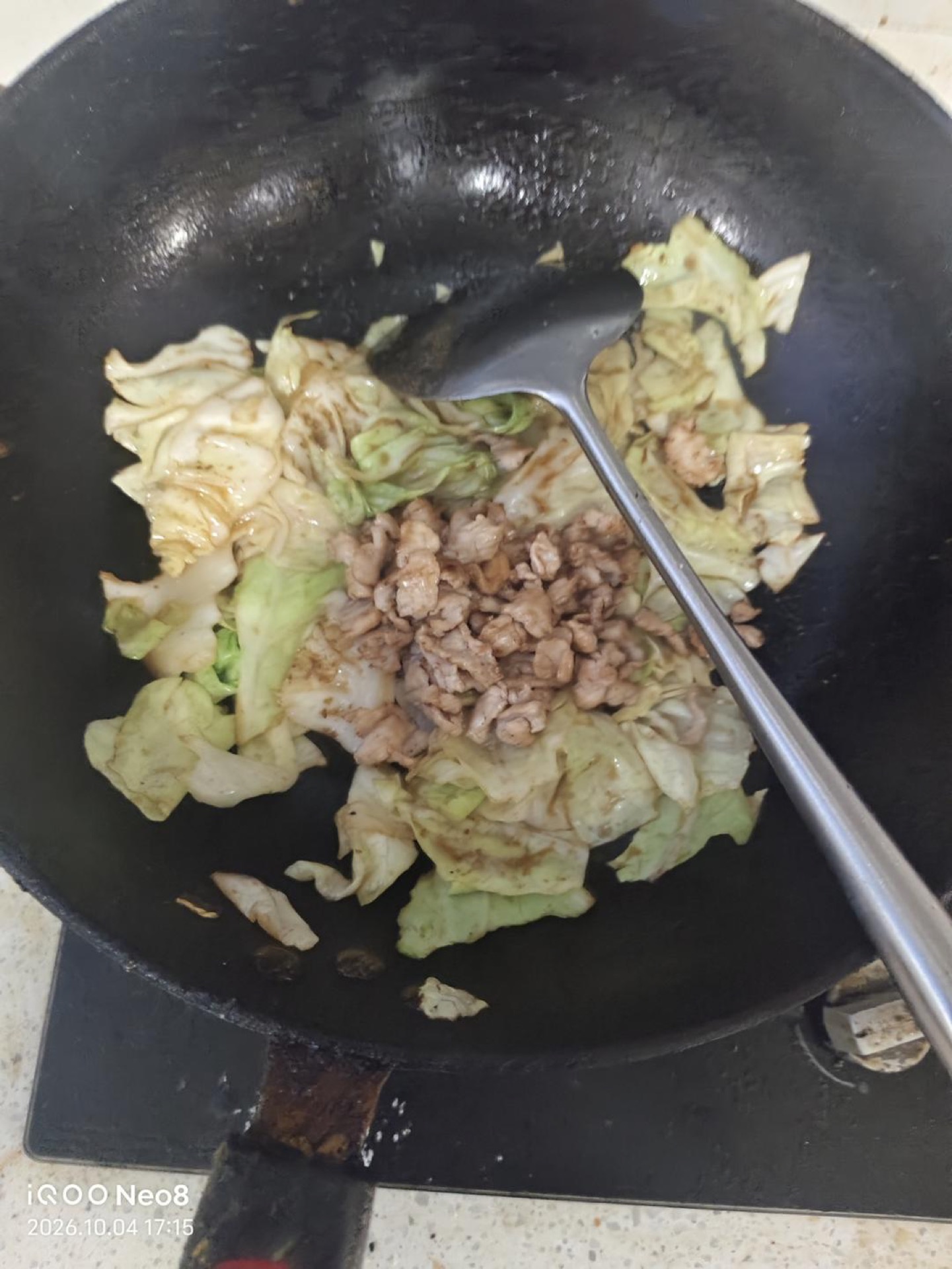 Add the seasonings — oyster sauce, sugar, salt, and cumin to taste — then return the pork to the wok and toss everything together.
