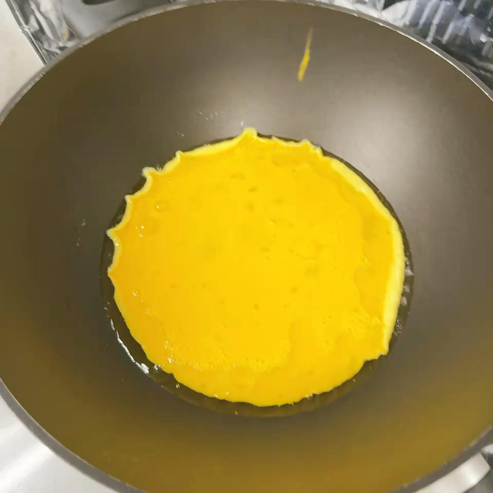 As they cook, push the eggs along with your spatula instead of stirring them hard.