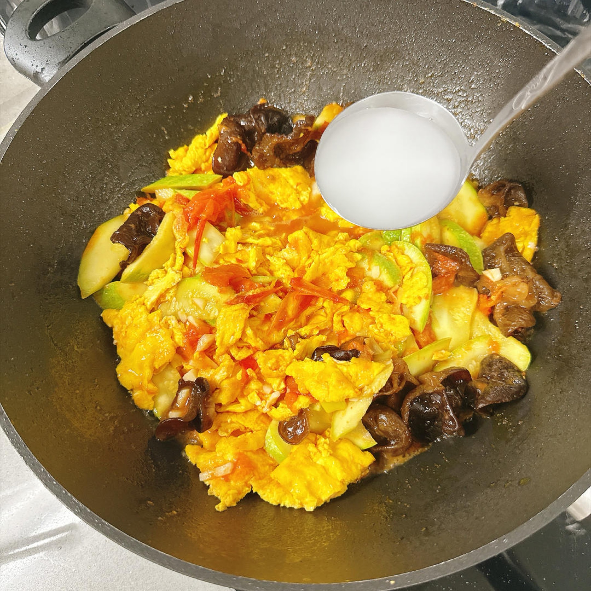 Stir everything together until the eggs are evenly blended.