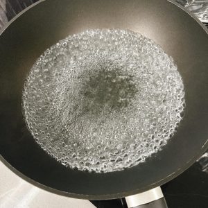Bring a pot of water to a rolling boil.
