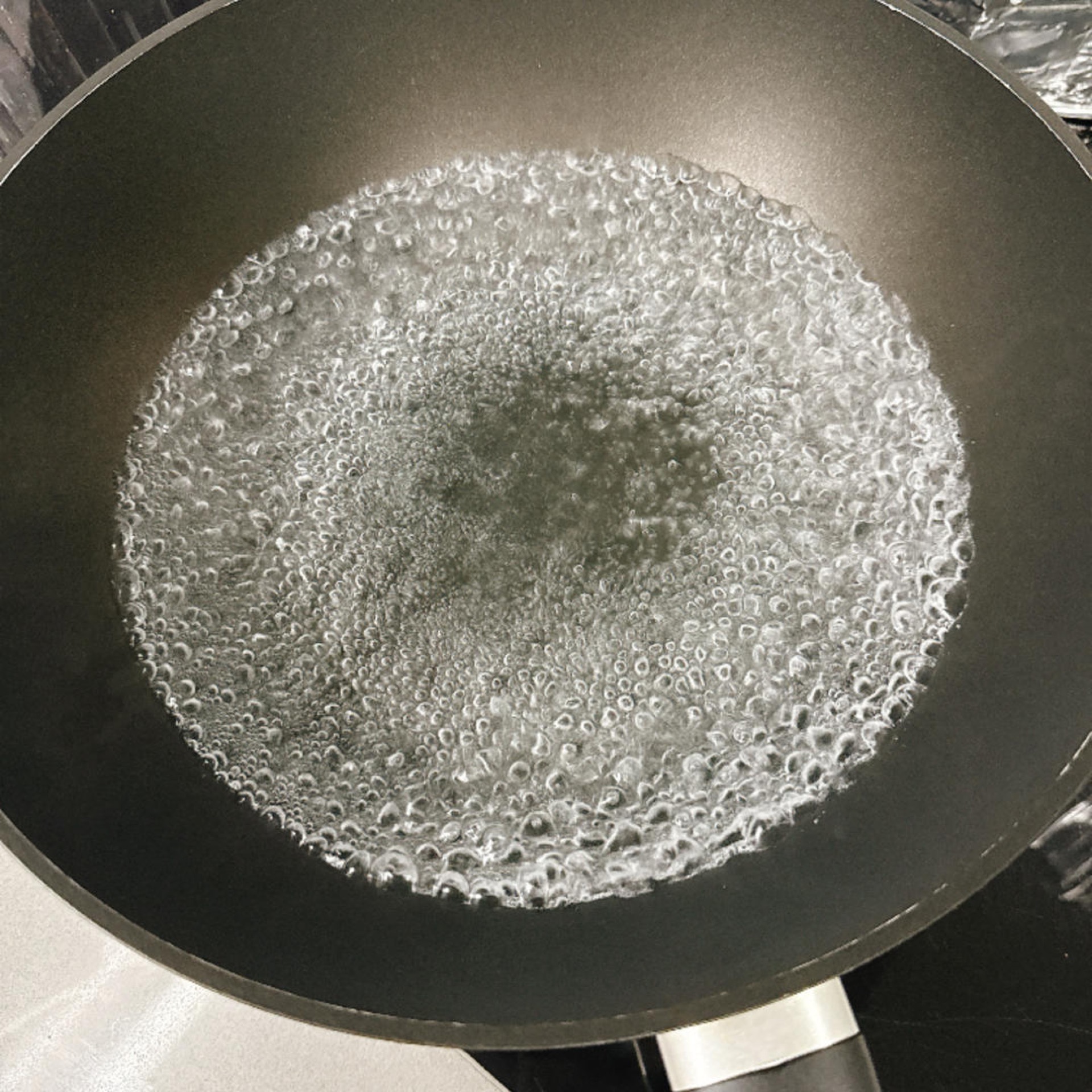 Bring a pot of water to a rolling boil.