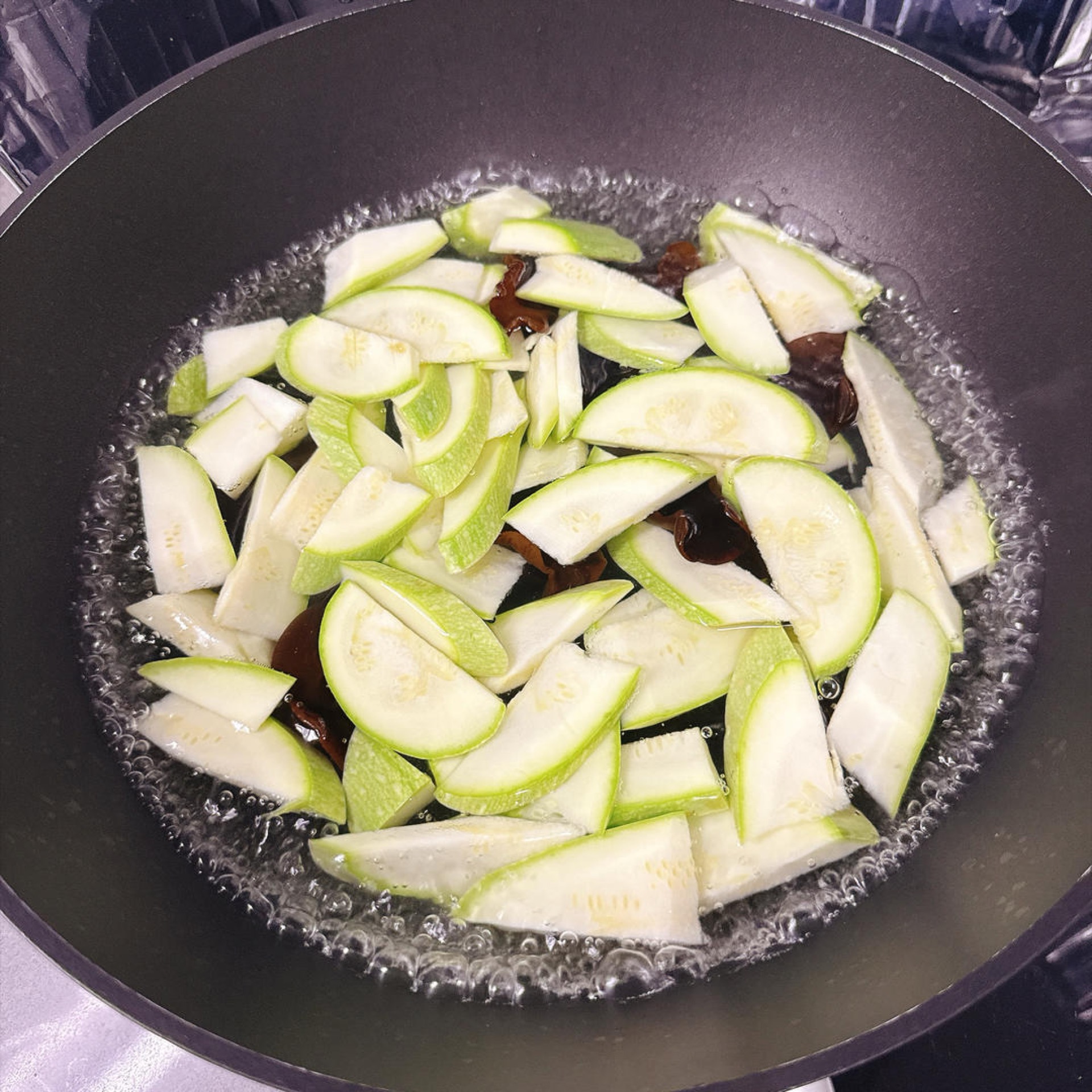 Cook for about 2 minutes, until the water comes back to a boil.